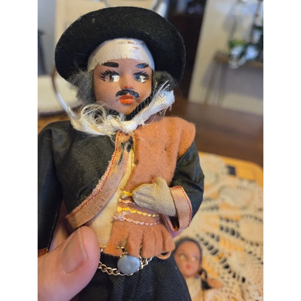 vintage Argentine gaucho folk art doll featuring a hand-painted face